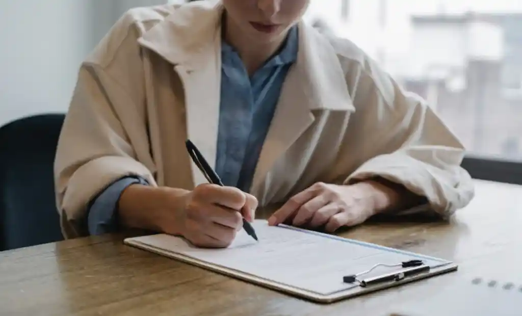 person completing application form
